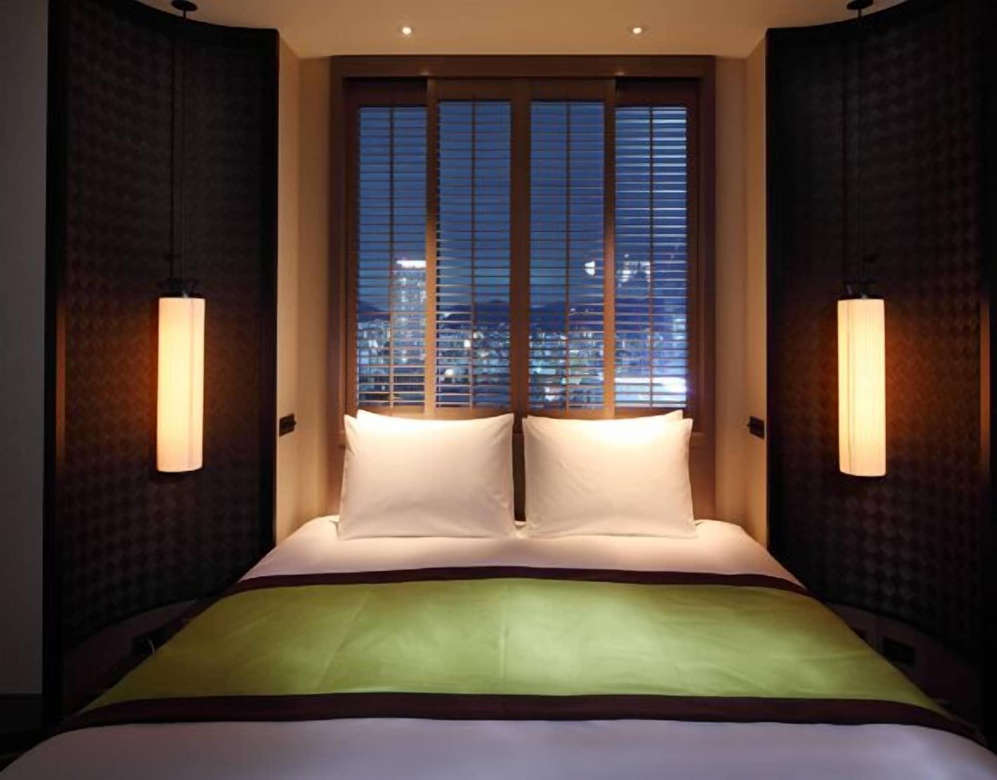 Oriental Hotel Kobe Exterior foto A bedroom at the hotel